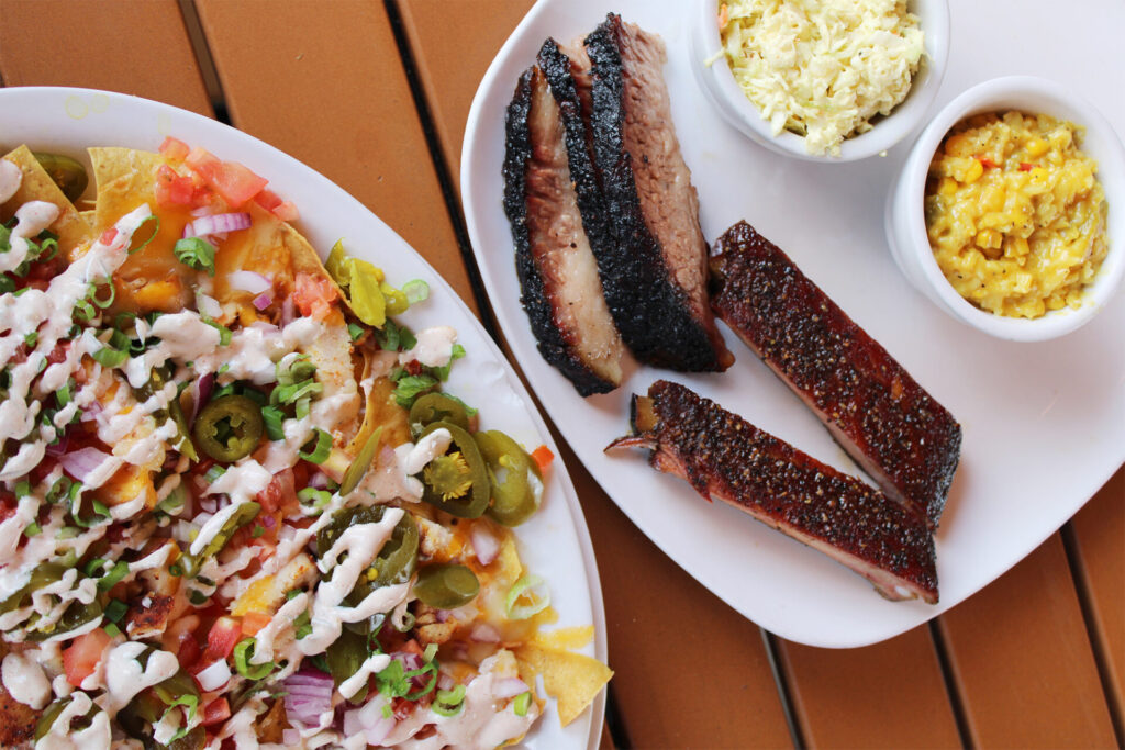 BBQ nachos, ribs, brisket, creamed corn, and coleslaw at Naaman's Championship BBQ in Texarkana, Arkansas