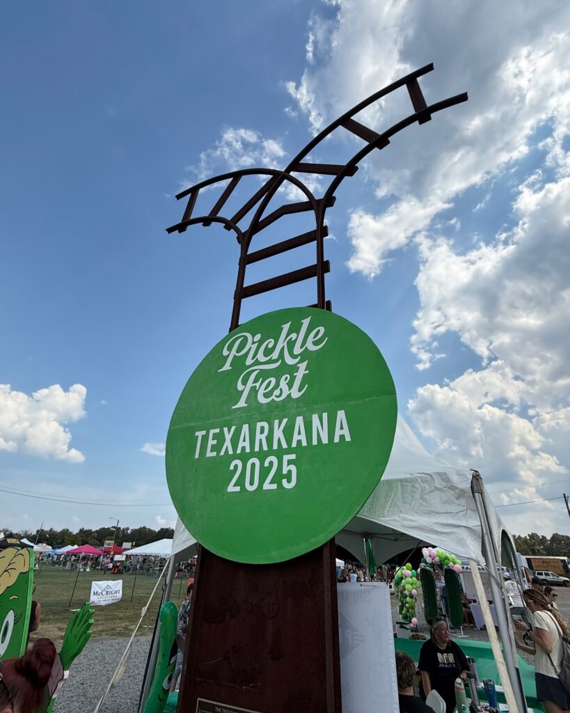 Large green Pickle Fest Texarkana 2025 sign at Front Street Festival Plaza in Texarkana, Arkansas