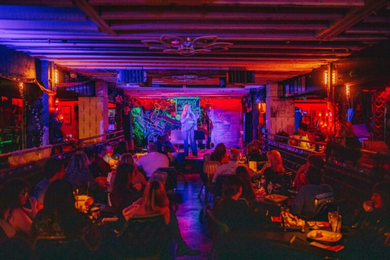 Audience enjoying live comedy night at 1923 Banana Club in Texarkana during January 2026 event lineup.