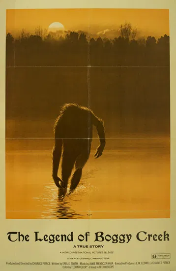 Movie poster for The Legend of Boggy Creek featuring a monster silhouette in a swamp setting