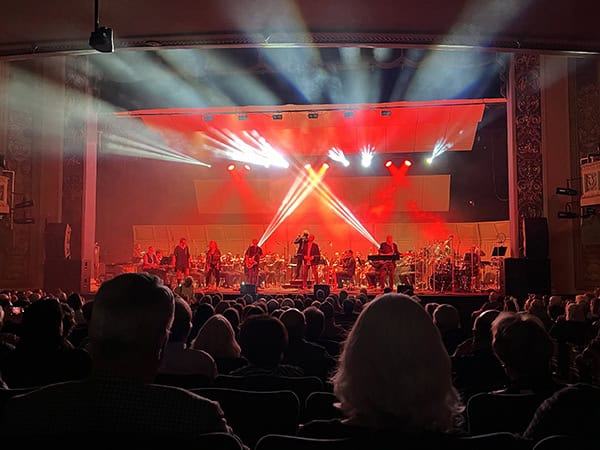 A symphony performs on the Perot Theatre stage
