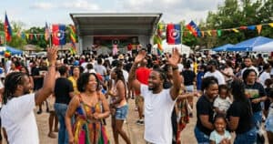 Crowd gathers for live music during the Texarkana Juneteenth Festival.